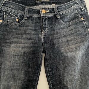 Bebe Black Skinny Jeans with Stylish Distressing